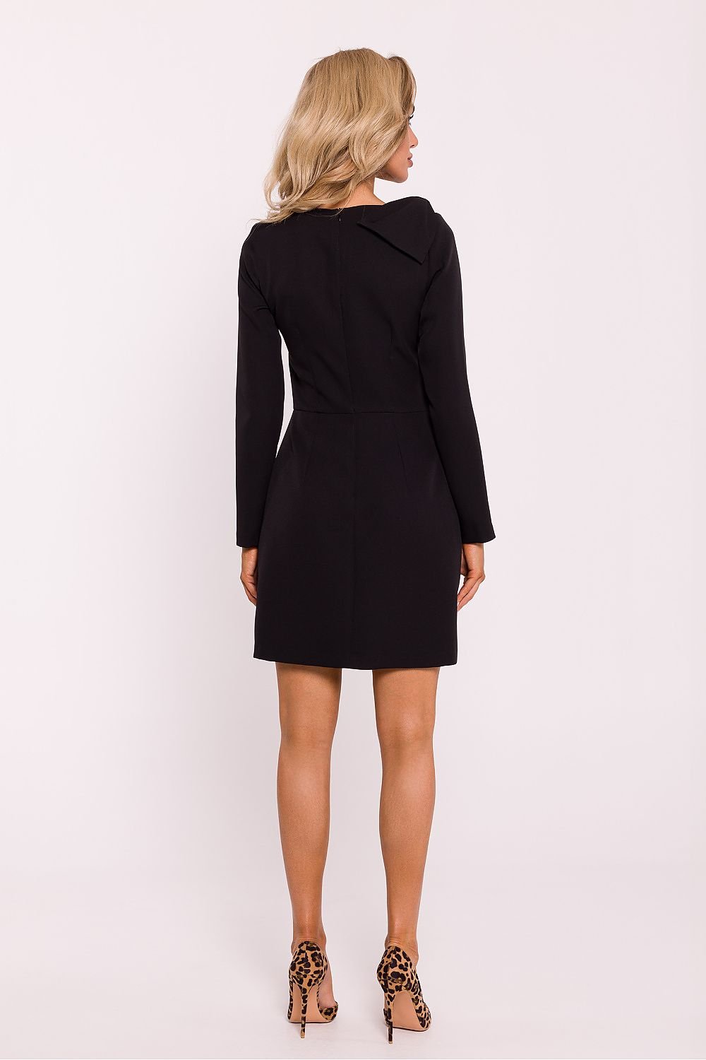 ÉclatKnot Mini jurk gedragen met hakken en clutch voor avondlook