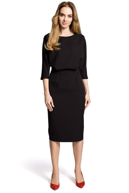Nocturne Grace avondjurk met figuurnaden in de taille en losvallende pasvorm – perfect voor stijlvolle gelegenheden.